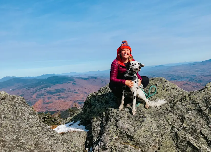 Author Kirsten hiking with her dog, Theo!